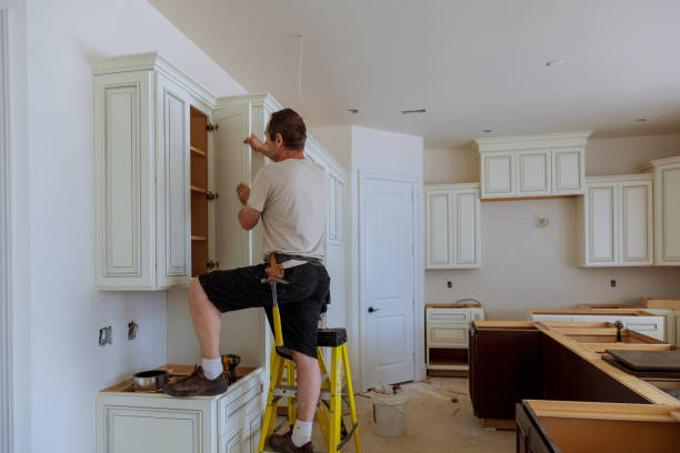 Open concept kitchen conversion in Newport by JMT Kitchen Cabinet